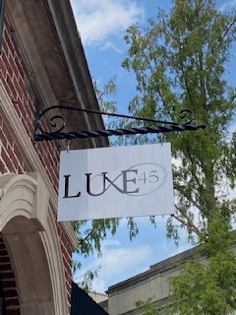 Luxe45 signage outside of the store